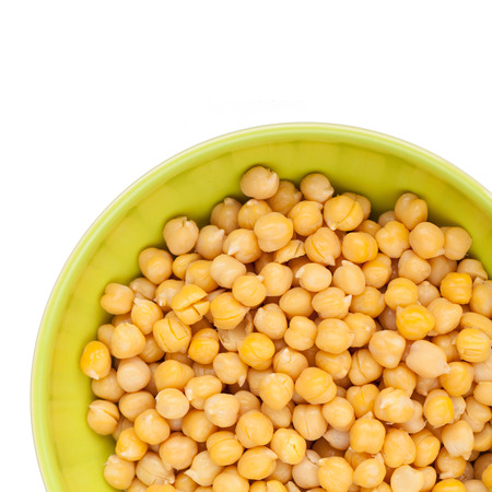 cooked and peeled chickpeas in green cupの写真素材