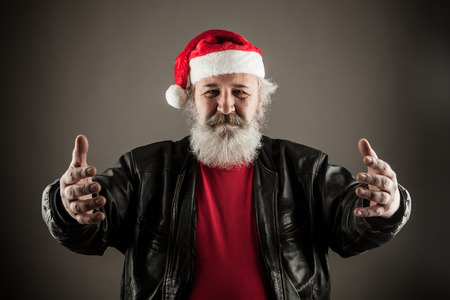 Funny mature man with real beard dressed as Santa Clausの写真素材