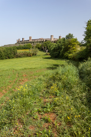Little tuscan village on the hill Monteriggioniの写真素材