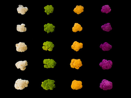 Caulifower of different colours on black backgroundの写真素材
