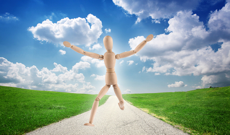 Dummy running down the road with open armsの写真素材