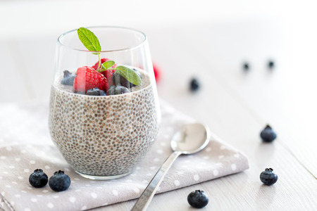Healthy chia pudding with almond milk in a glassの写真素材