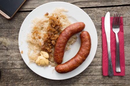 Sausage and cabbage with pork graves servedの写真素材