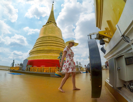 Young caucasian woman on the top of Golden Mount, Bangkokの写真素材