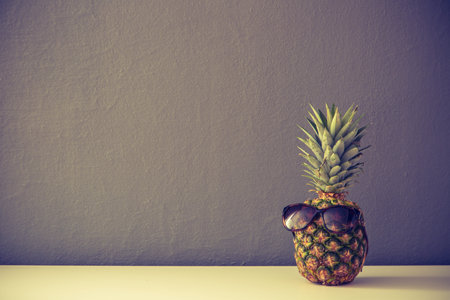 Pinapple with glasses with cross process filter