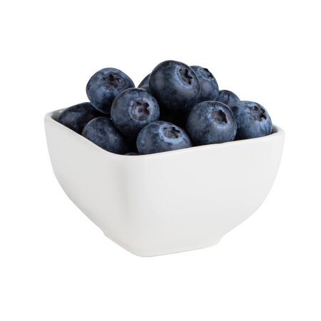 Blueberries in small white pot isolated on white with clipping pathの写真素材