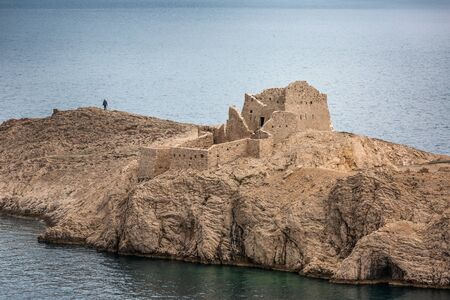 Old ruins of fortress Fortica near Pag bridge in Croatian Dalmatia Coastの写真素材