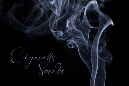 Cigarette smoke on black backgroundの写真素材