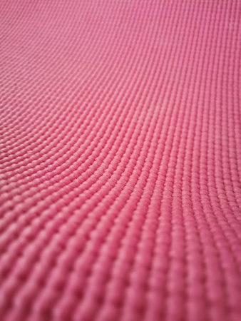 Close up of pink yoga mat
