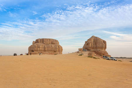 AL HOFUF, SAUDI ARABIA - FEBRUARY 13TH, 2021: People enjoying time together around rock formation called Four Mountains near Al Hofuf, Saudi Arabiaのeditorial素材
