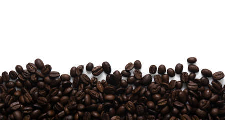 Roasted coffee beans on white background.の写真素材