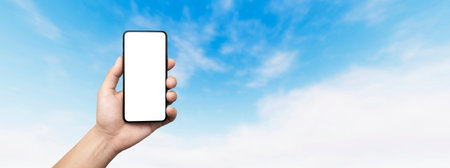 concept - cell phone in hand in the clouds with white screen - easy modification