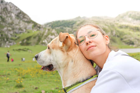 Family, girl and dog traveling togetherの写真素材