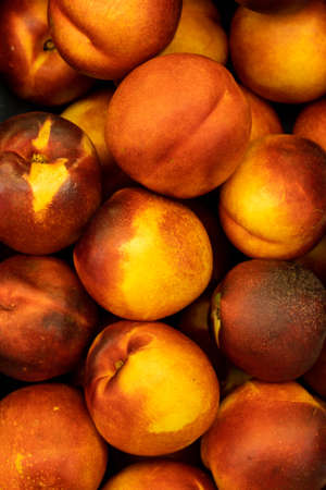 closeup of fresh red nectarinesの写真素材