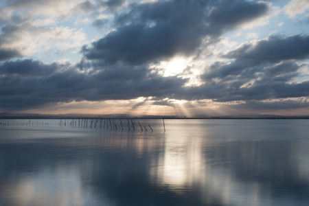 Valencia, Spain - May 03, 2017: Sunset at the viewpoint of the Albufera of Valencia, Spain.の写真素材