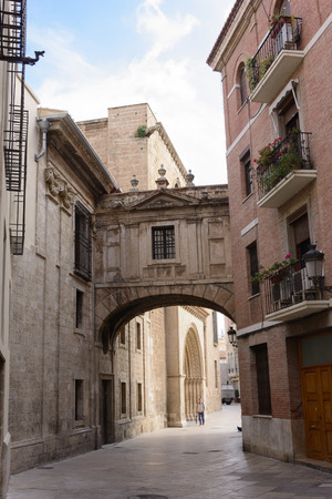Valencia, Spain - May 19, 2016: Arch in Calle de la Barchilla, between the cathedral and the archbishopric of valencia.のeditorial素材