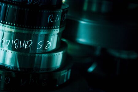 Old reels of film waiting for the editing roomの写真素材