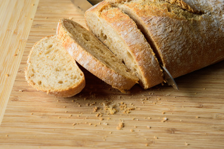 Bread cut by a knifeの写真素材