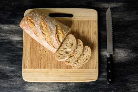 Bread cut by a knifeの写真素材