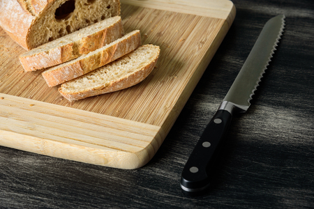Bread cut by a knifeの写真素材