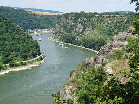 Because of the Loreley, St. Goar is one of the most famous villages in the Rhine Valley. On both sides of the river are beautiful trails, the ships are well filled.の写真素材