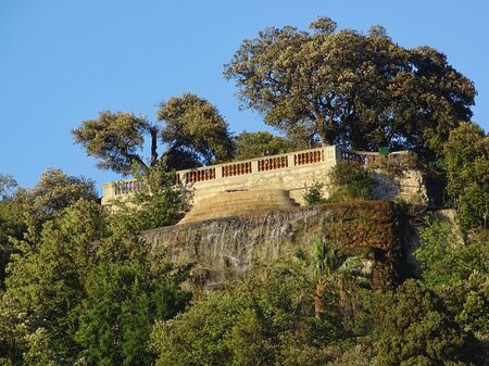 The cascade is part of the Colline du Chateau in Nice, a landmark of the city. The photo was taken from the Nice waterfront.の写真素材