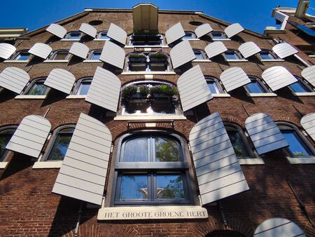 Window of a residential house on a canal in Amsterdam.の写真素材