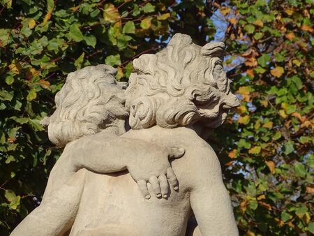 Cuddling pair of putti in the Dresden Zwinger (Saxony / Germany)の写真素材