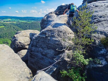 Hiking above the sandstone formations is a great adventure in the Saxon Switzerland.の写真素材