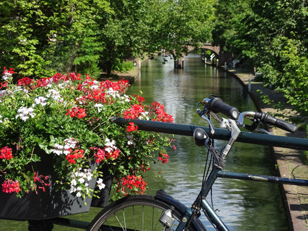 Bicycle over the Oudegracht Canal in Utrecht Netherlandsの写真素材