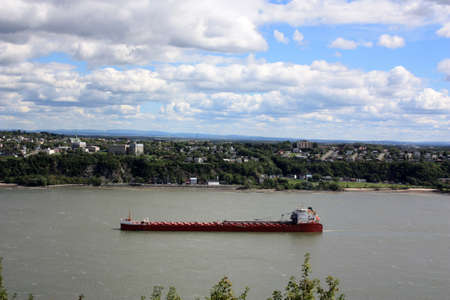 Cargo ship on the Saint Lawrence River in Quebec City, Canadaの写真素材
