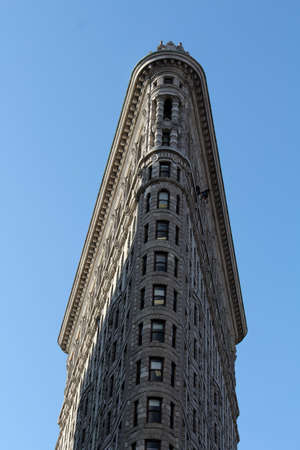 The Flatiron Building is a skyscraper in the Flatiron District of Manhattan named after itのeditorial素材