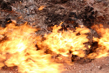 Yanar Dag, is a natural gas fire that has been burning since ancient times on the slope of a hill in Azerbaijanの写真素材
