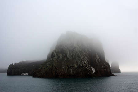 Neptunes Bellows is a strait and the entrance to Deception Island. The island is the summit area of an active volcano.の写真素材