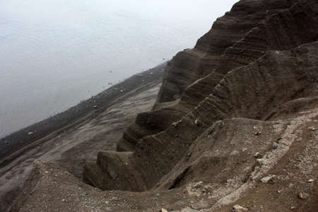 Cliffs on the caldera on Deception Island, Antarctica. Deception Island is one of the South Shetland Islands and the summit area of an active volcano.の写真素材