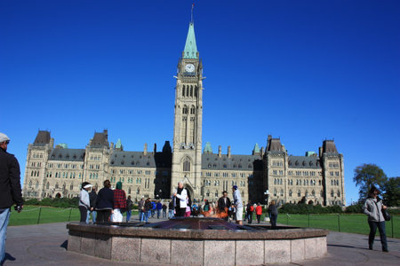 Ottawa Parliament Building. In the foreground the Centennial Flame.のeditorial素材