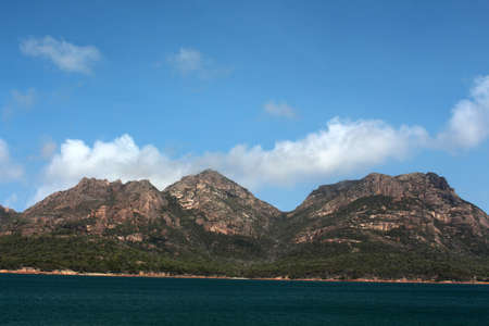 Tasmania coastal landscape Freycinet National Park with Mount Amos, Mount Dove, Mount Maysonの写真素材