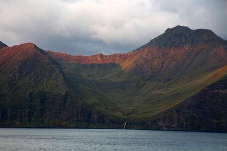 Sunrise on the coast of Unalaska Island, Aleutian, Alaskaの写真素材