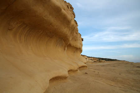 Eroded sandstone cliffs of Xlendi, Gozo, Maltaの写真素材