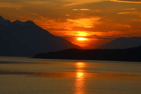 Sunset in Favorite Channel, Alaskaの写真素材