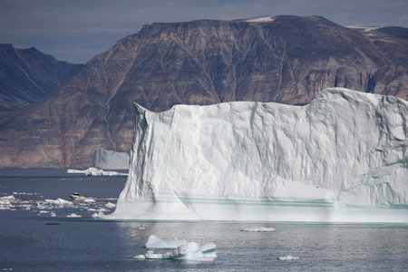Monumental iceberg in Uummannaq Fjord, Greenland, Denmark