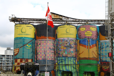 Colorful cement silos painted with cartoon characters on Granville Island, Vancouver, British Columbia, Canadaのeditorial素材