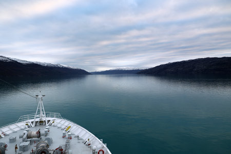 <p>Mountain range in a waterway of the Kangerlussuaq fjord Greenland, Denmark</p>の写真素材