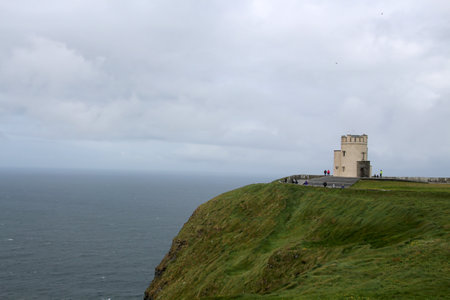 O'Brien's Tower at the world famous Cliffs of Moher in County Clare, Irelandの写真素材
