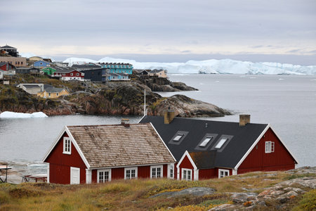 Houses on the coast of Ilulissat, Greenland, Denmarkの写真素材