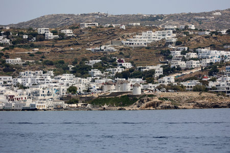 Coastal view of the Cyclades island of Mykonos with its famous windmills-Greeceの写真素材