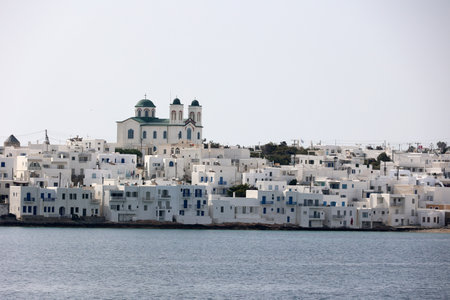 View of the Naoussa-Paros coast with the Faneromeni Church on the right in the backgroundの写真素材