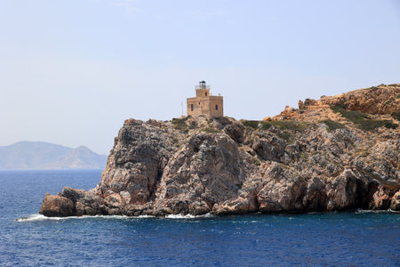 The lighthouse of the Cyclades island of Ios-Greeceの写真素材
