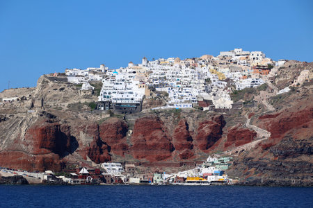 View of Oia on the crater rim from the Cyclades island of Santorini-Thera -Greeceの写真素材