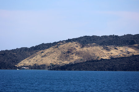 View of the caldera with lava island Nea Kameni the Cycladic island of Santorini-Greeceの写真素材
